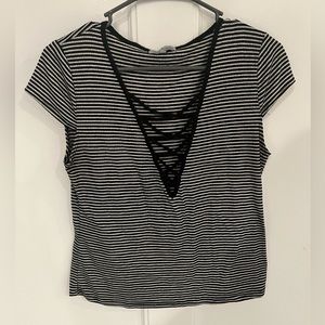 Black striped top with laced v-neck front